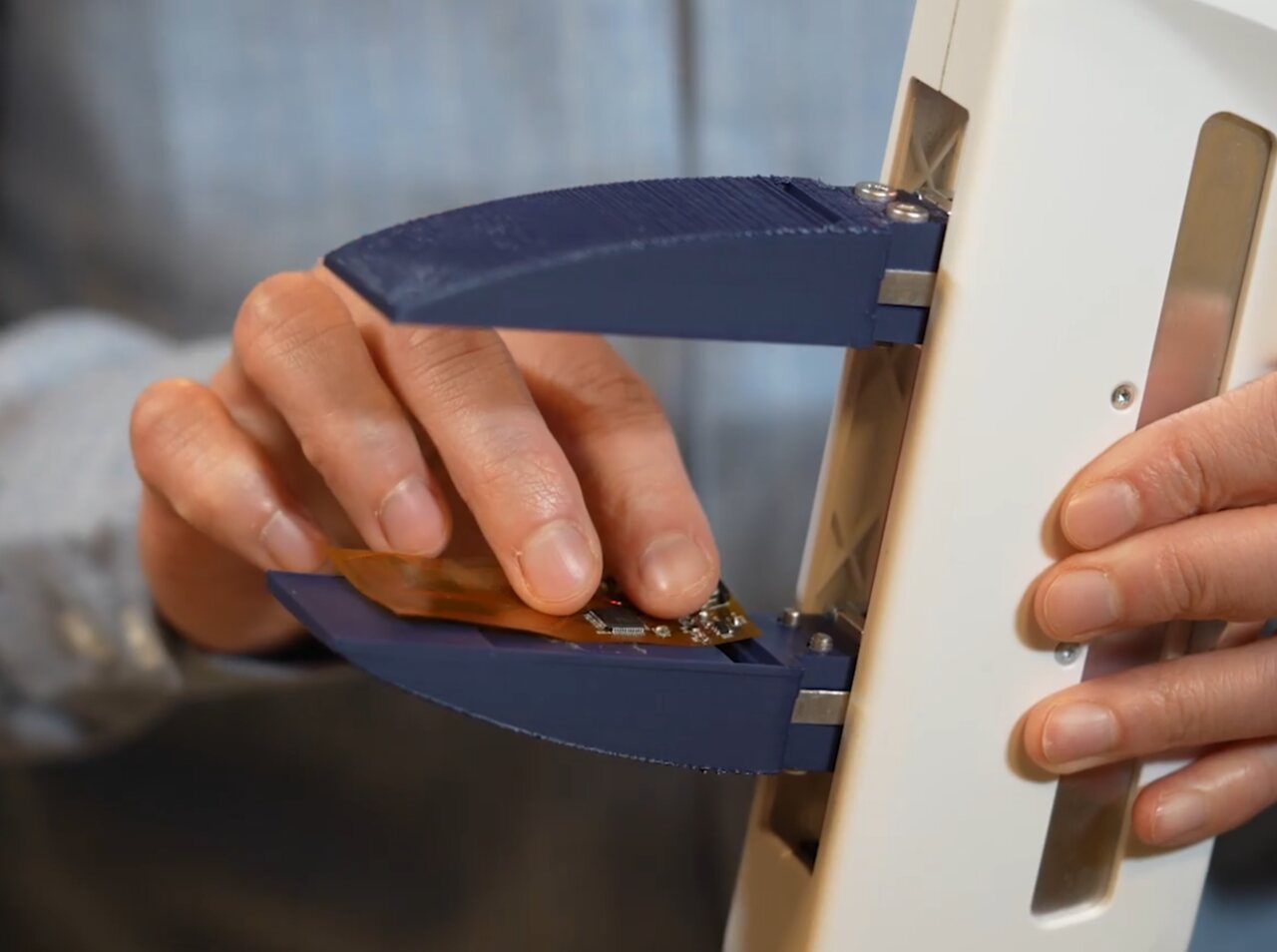 Analog Devices tactile sensor held in a 3D-printed gripper