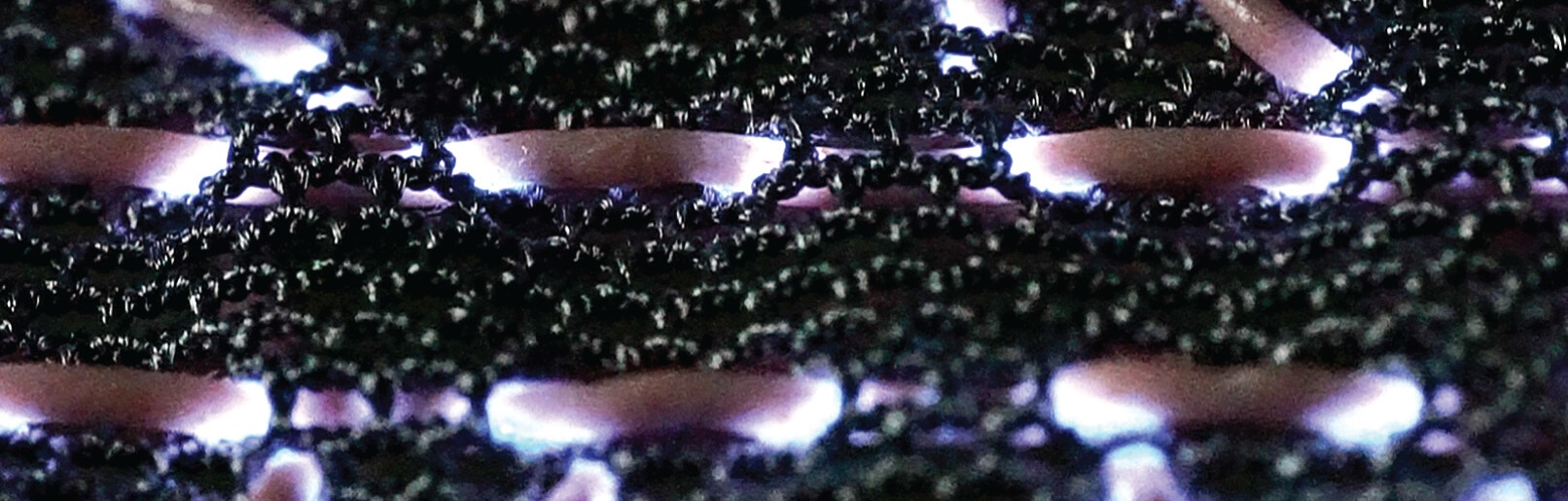Intelligent textiles with integrated fiber electronics